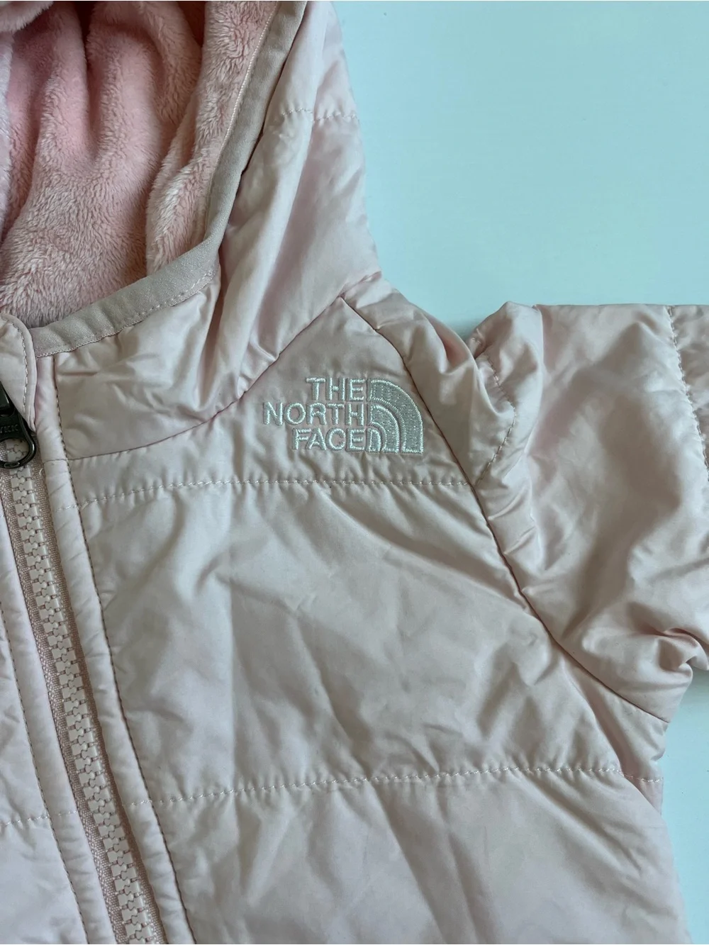 The North Face Pale Pink Hooded Infant One-Piece Snowsuit